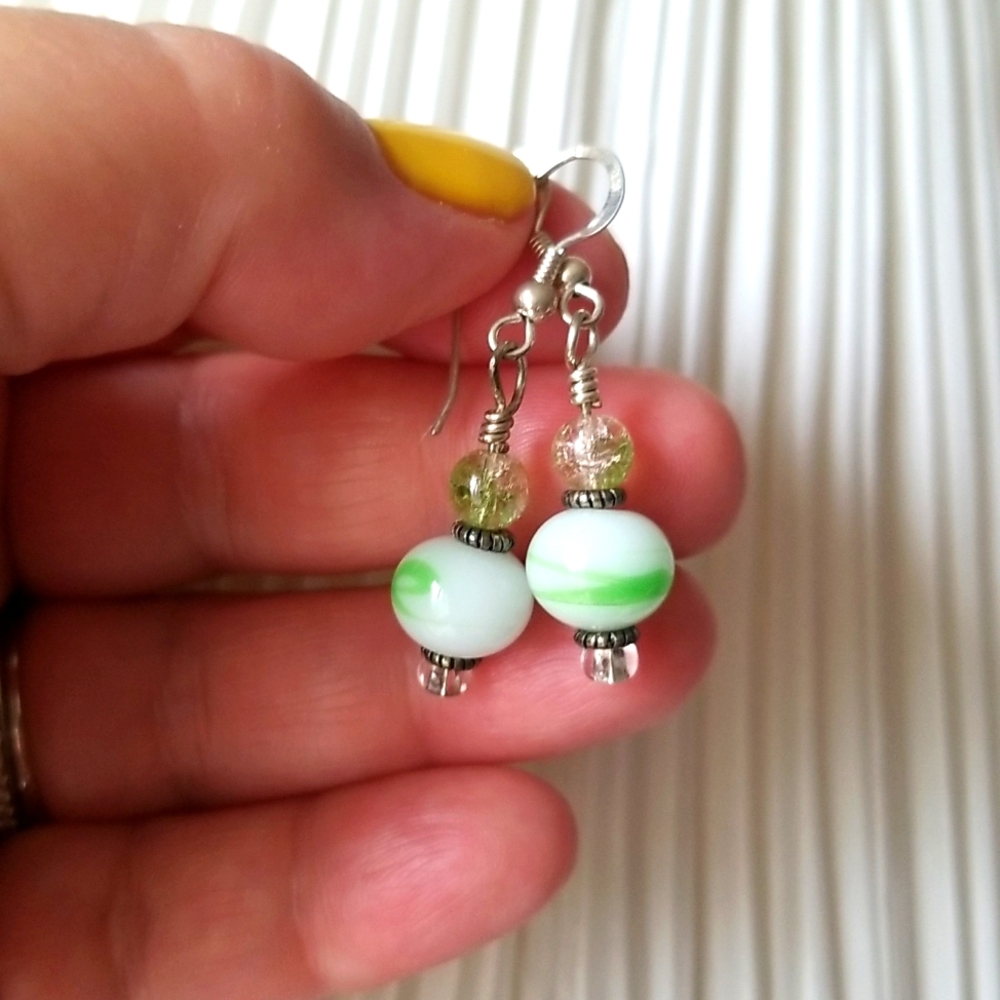 Sterling Silver earrings with green glass beads.